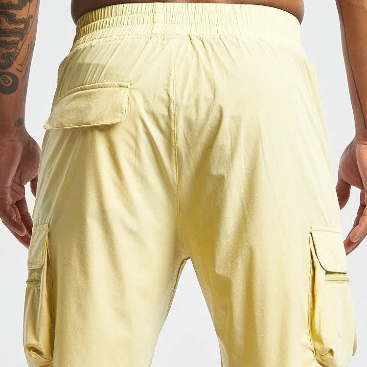 Men's black quick-dry sports shorts with elastic waistband for fitness and running.