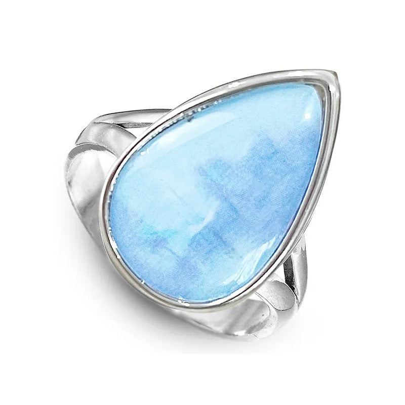 Women's copper drop-shaped geometric ring in electroplated A077 white gold colour, side view on white background