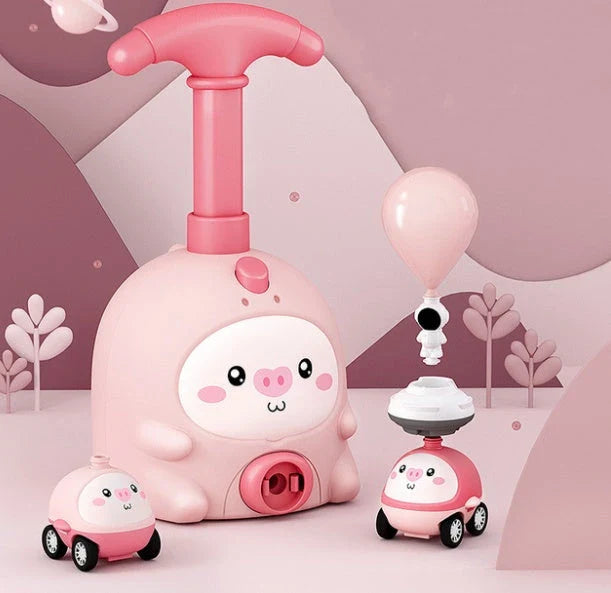 Colorful balloon-powered car toy with various animal designs, featuring a launch tower and balloons for children to propel the car using air power