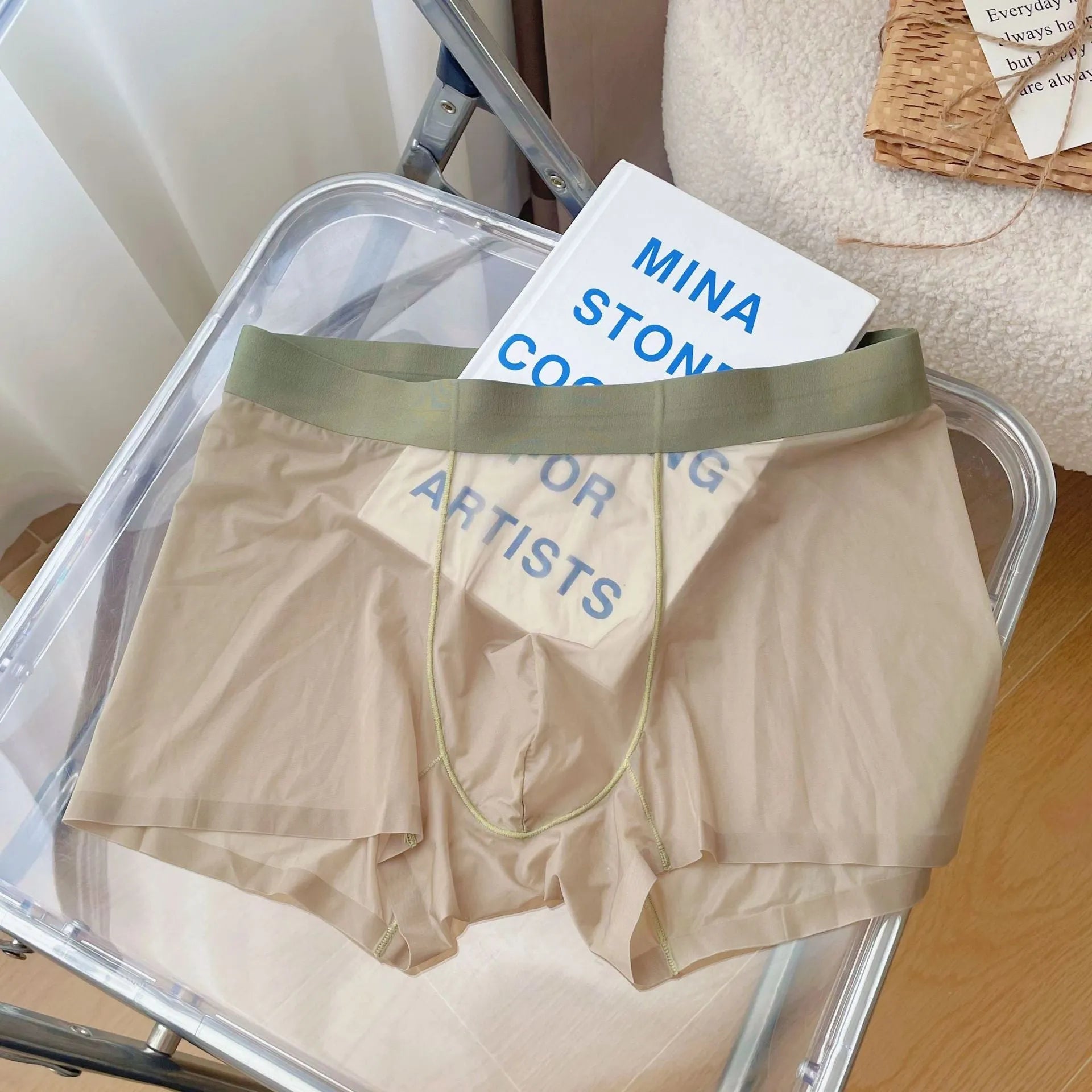 Seamless men's boxer shorts in rock ash colour, showing mid waist fit and quick-dry fabric.