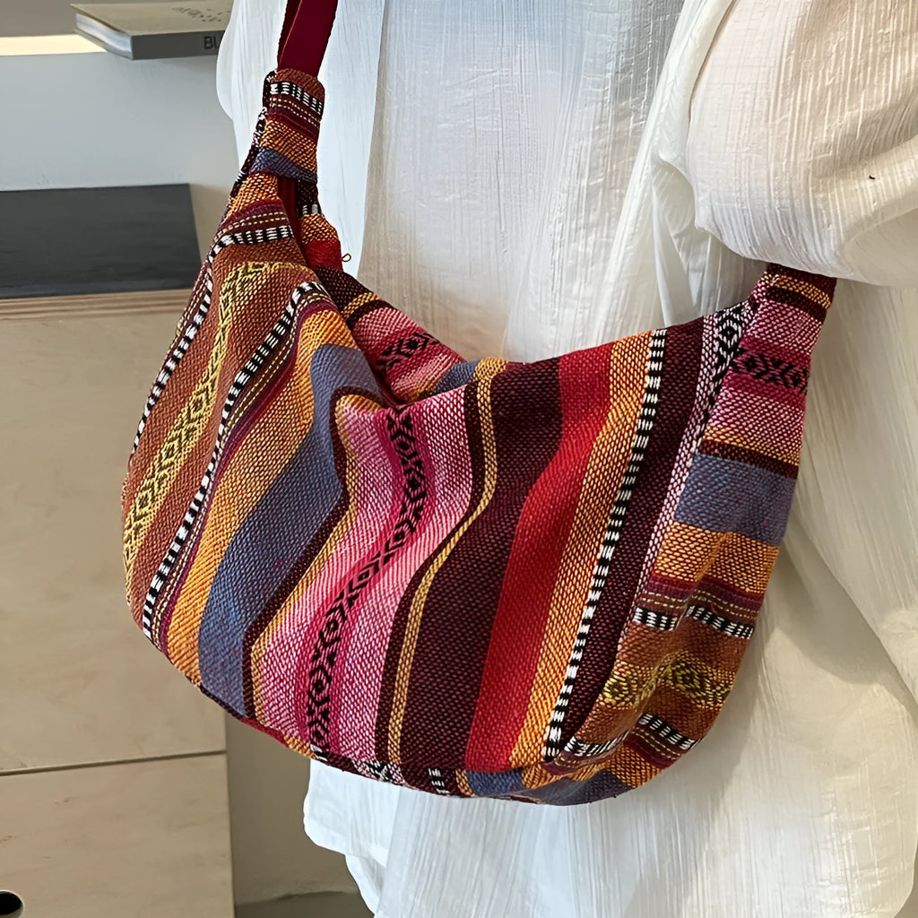 Women's ethnic style canvas dumpling crossbody bag in five colours.
