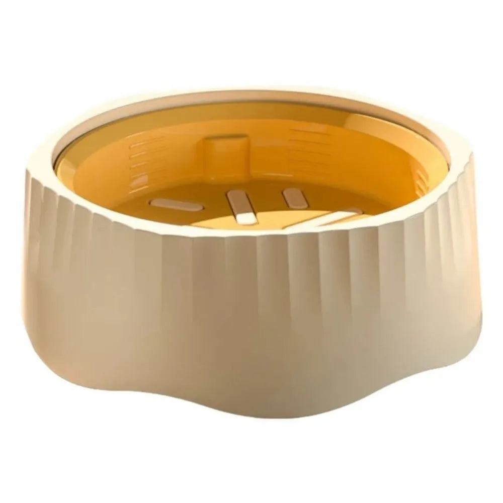 Blue plastic slow feeder dog bowl with detachable maze interior on a wooden floor.