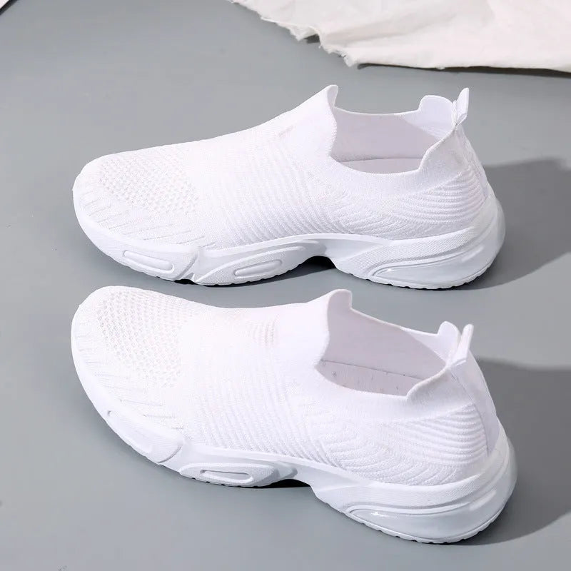 Slip-on sock shoes with mesh lining and lightweight PVC sole in black, white, khaki and pink colours