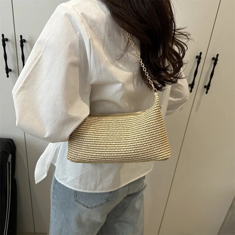 Horizontal square straw woven beach tote bag with sandwich pocket and internal phone compartment