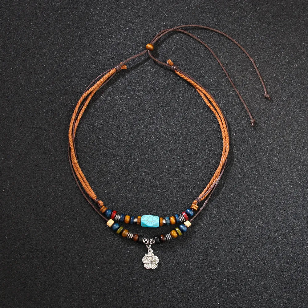 Men's turquoise wooden bead necklace with geometric alloy pendant on cream wax rope