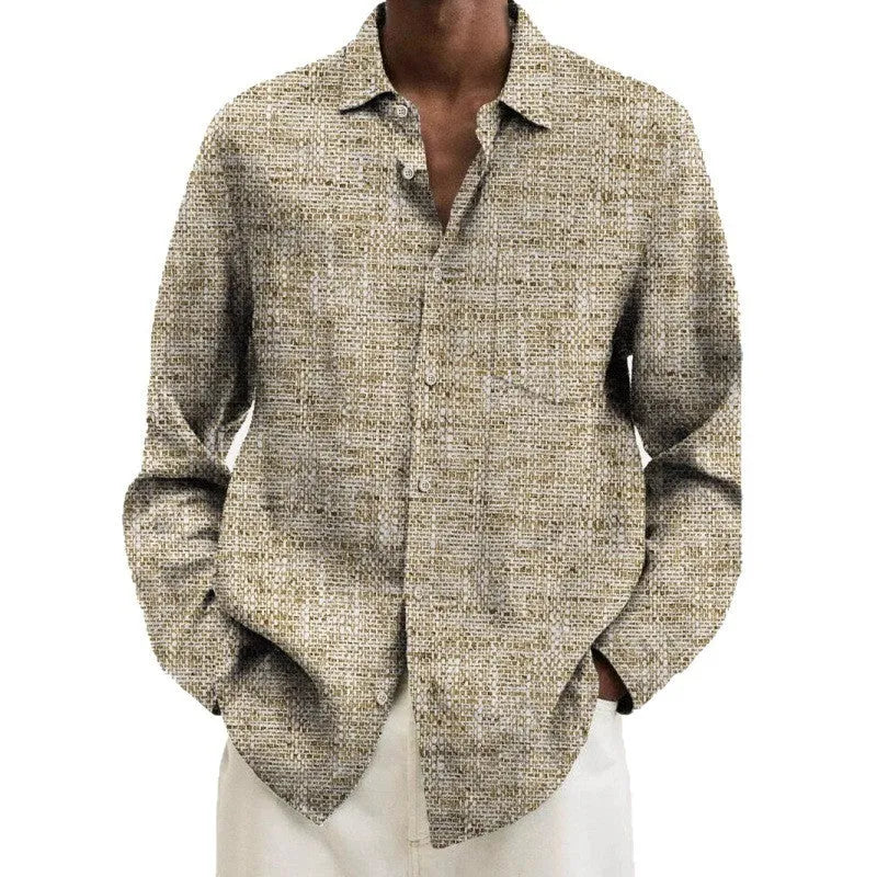 Man wearing a multi-colour geometric patterned long sleeve cardigan shirt for casual leisurewear.