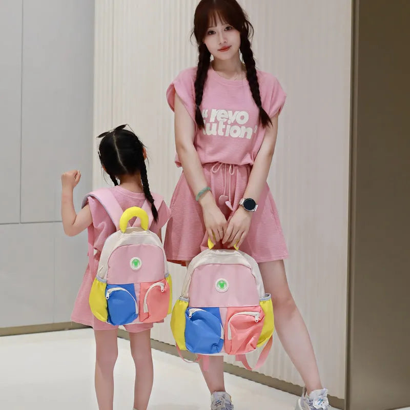 Children's trendy backpack in solid colour, lightweight Oxford cloth, blue pink yellow sizes small medium large