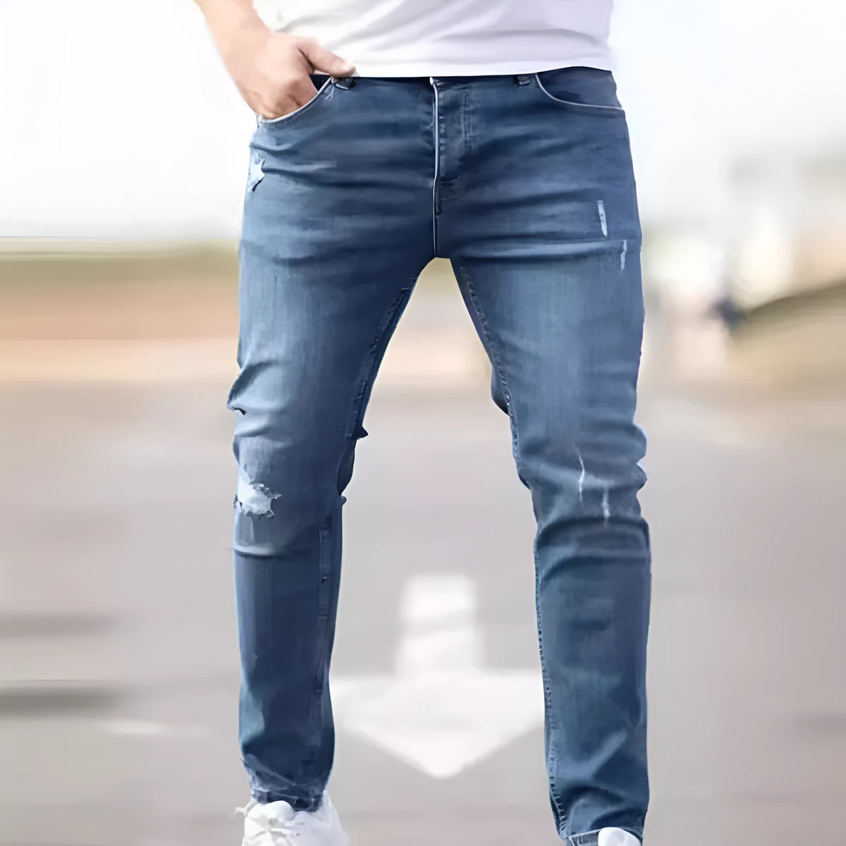Men's blue denim skinny jeans with medium stretch, cotton fabric, side view on mannequin