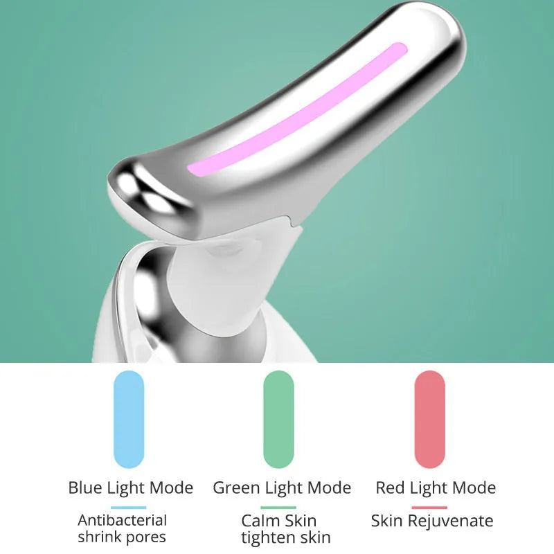 Black and silver EMS thermal neck lifting massager with LED lights on a skincare shelf.