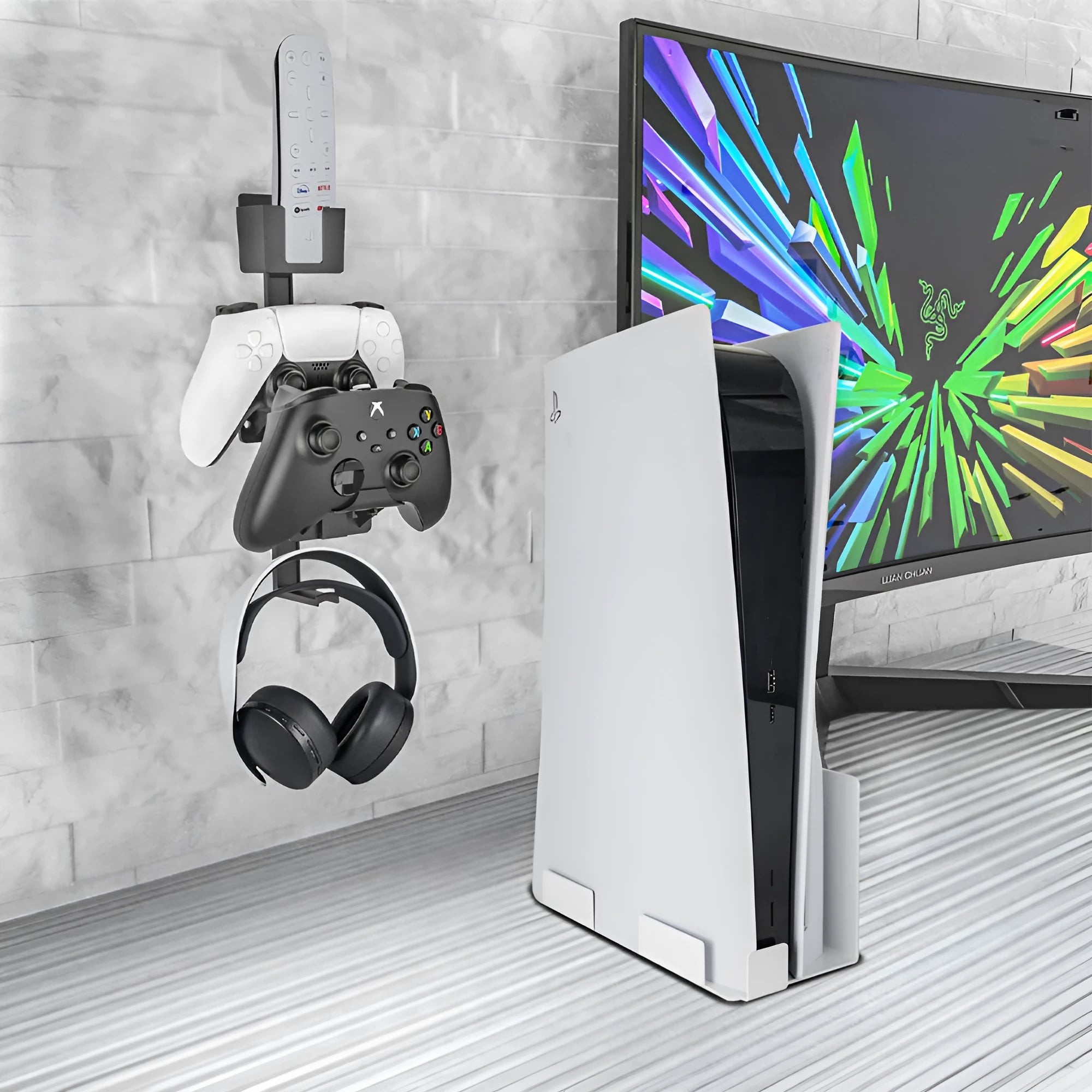 White wall-mounted hook holding a PS5 controller and gaming headset.