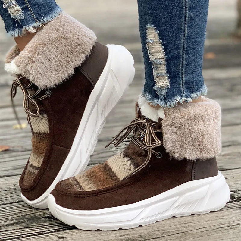 Women's beige lace-up snow boots with fuzzy lining and a thick rubber platform sole