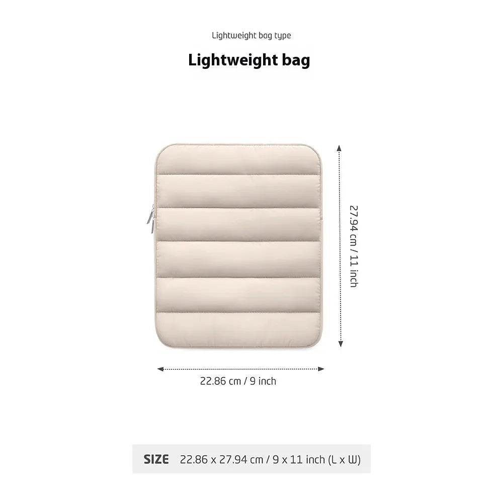 Puff bag laptop sleeve in black showing elastic sides and padded construction for 9.7-11 inch devices