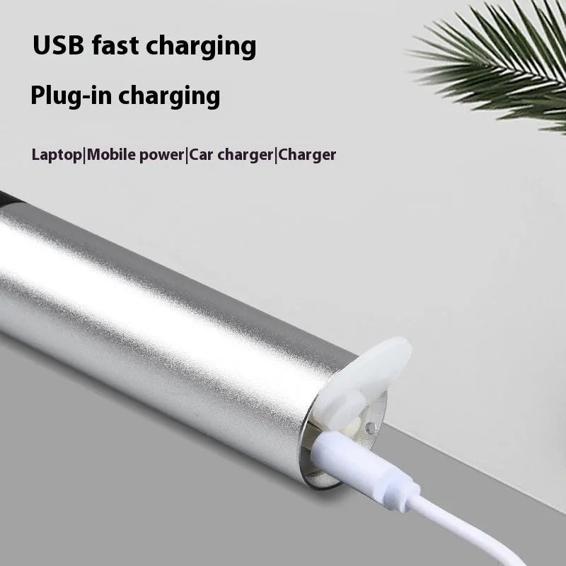 Black and silver aluminium red light therapy mosquito repellent lamp with charging cable.