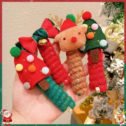 Festive Christmas Hair Ties with designs like jingle bells, Christmas trees, and reindeer - fun holiday accessories for girls