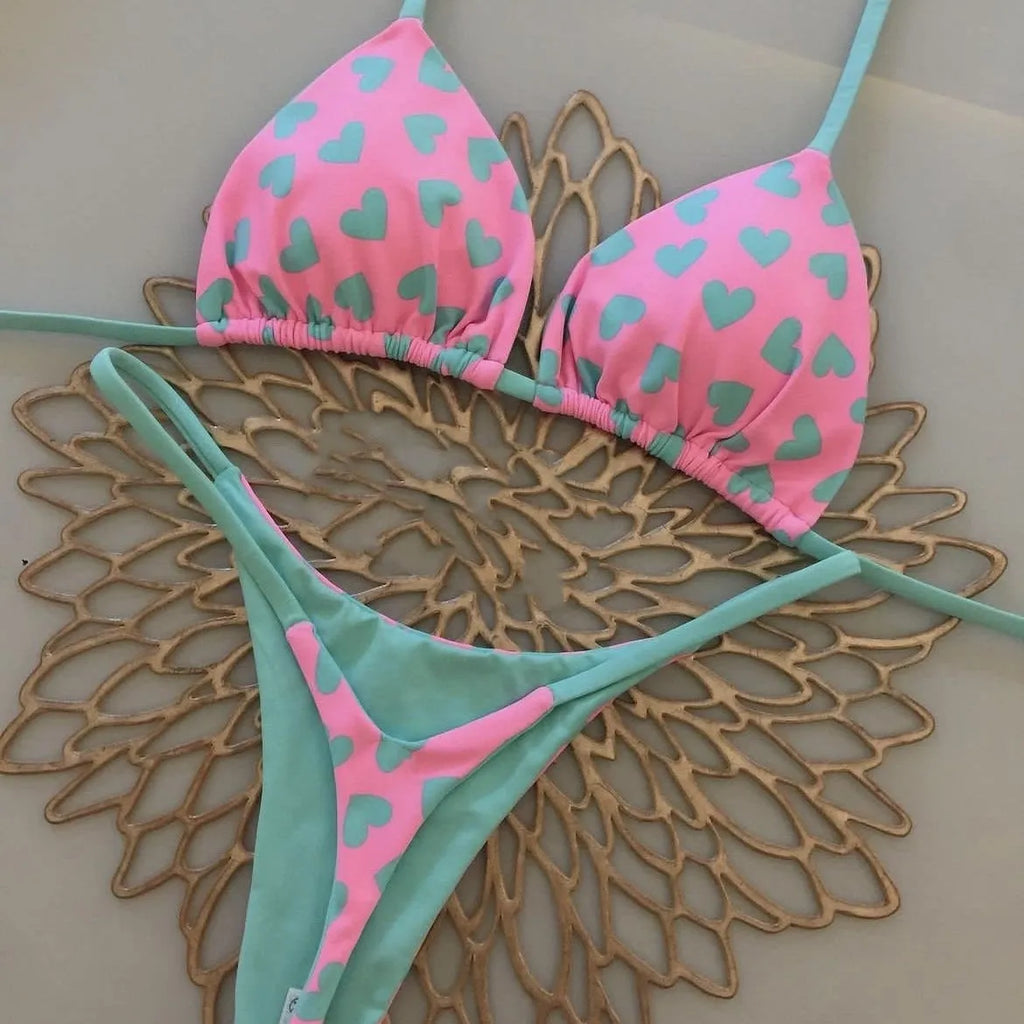 Women's printed lace-up split bikini set in nylon, available in six prints and sizes S, M, L.