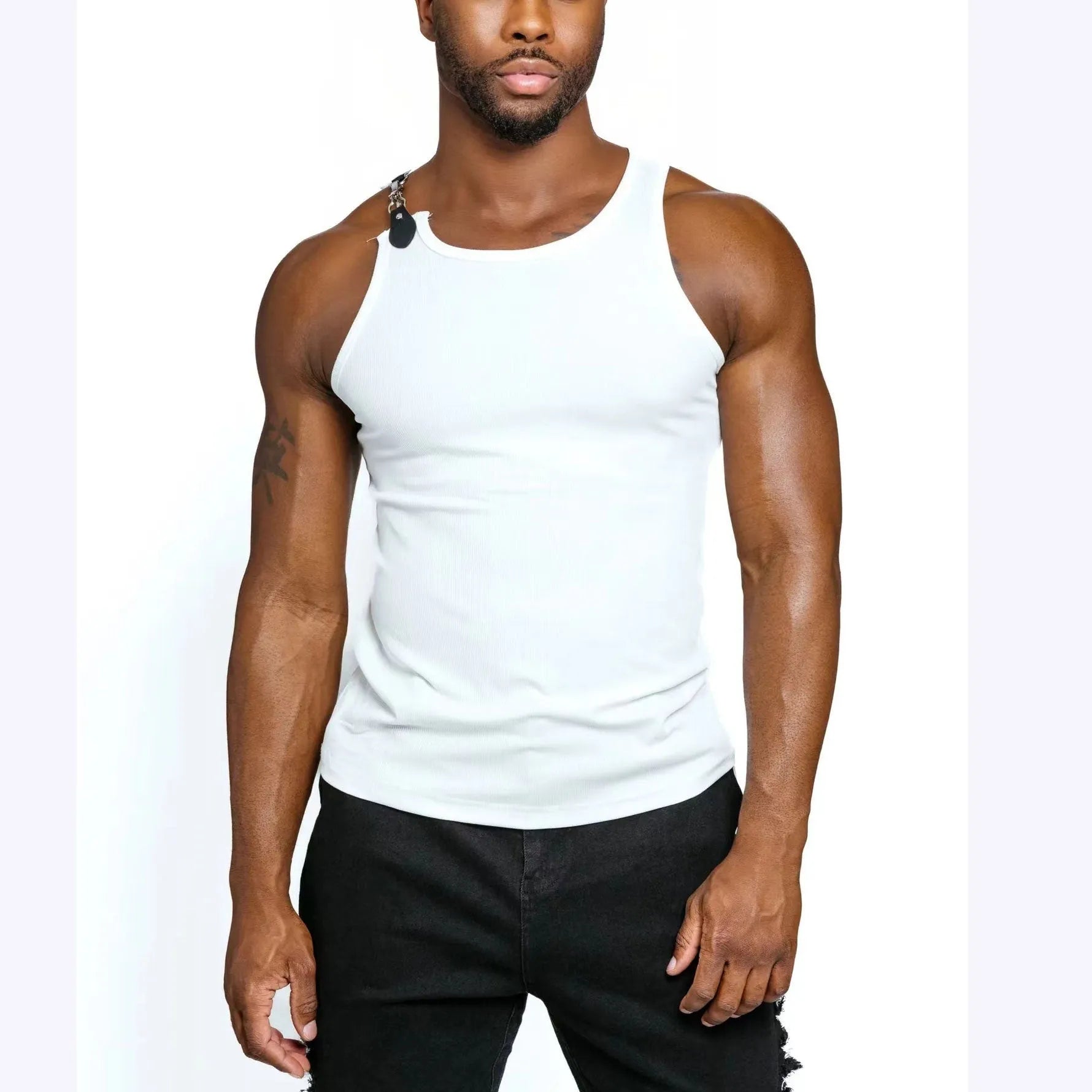 Black and white sleeveless cotton blend vest on a hanger, showing a tight fit.