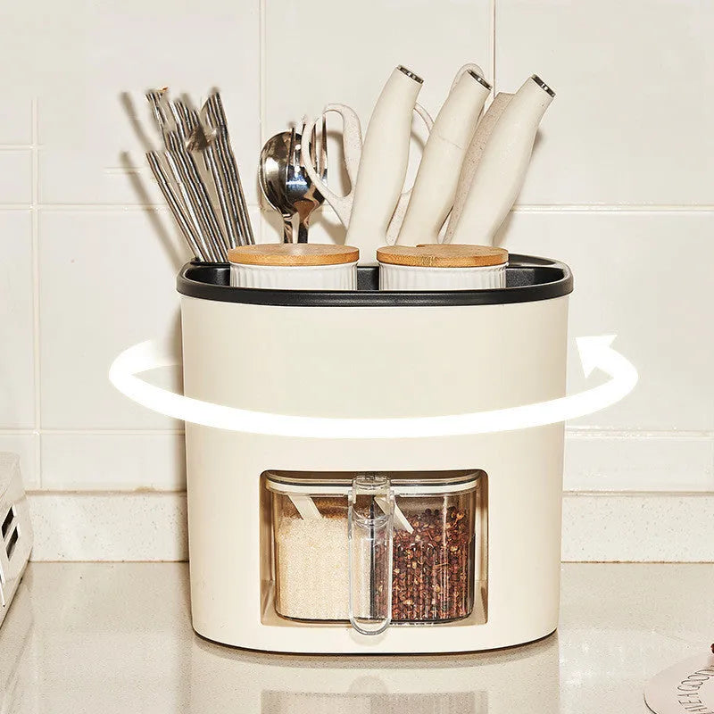 Rotating kitchen storage organiser with four compartments for cutlery and spices