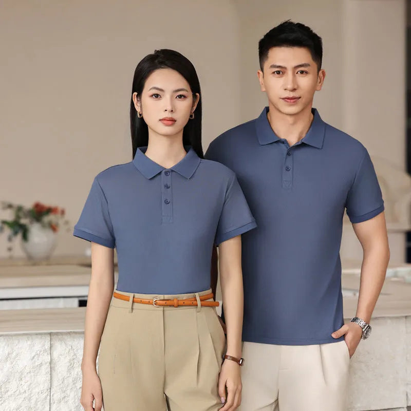 Men's short sleeve polo shirt in long-staple cotton, shown in emerald green with a slit hem.