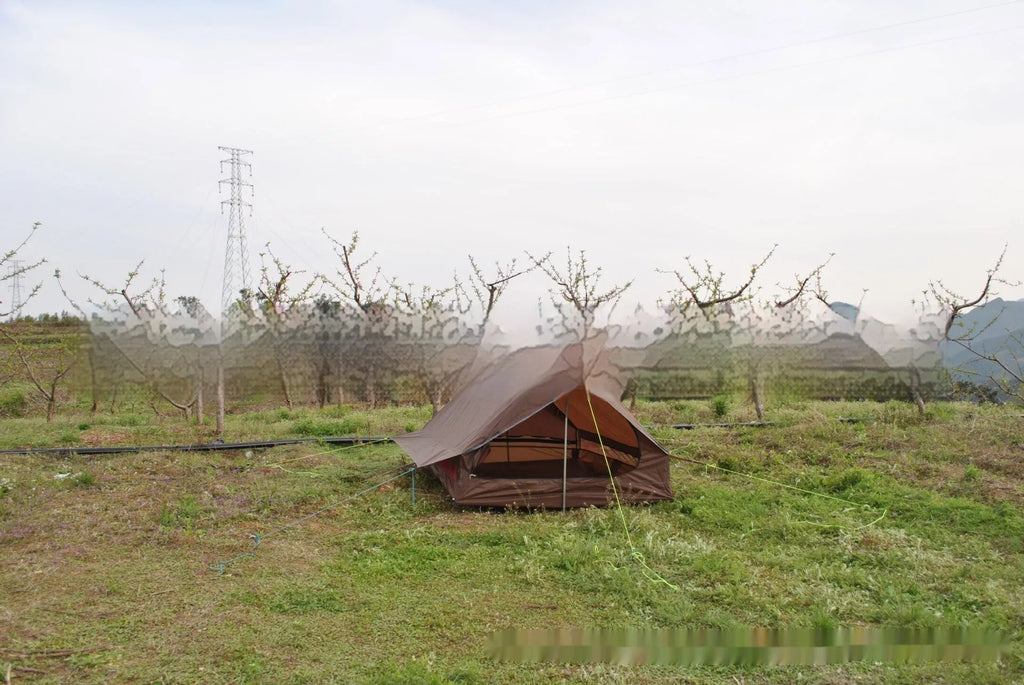 Brown or white A-line pole-free cabin tent for 2-3 people with hiking cane setup.