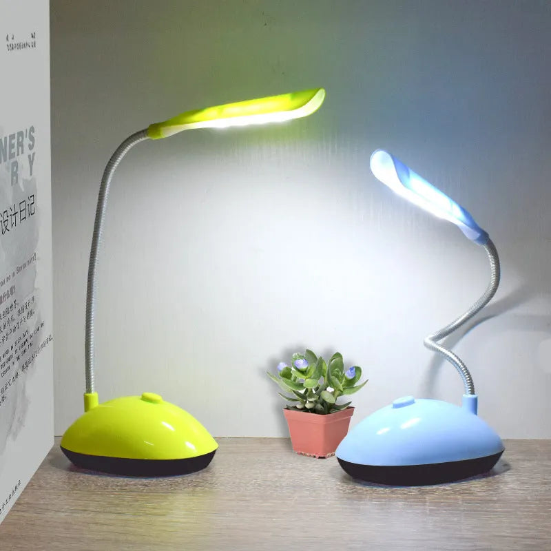 Battery LED desk lamp in white blue pink or green with three No7 batteries equipped for dormitory reading and study.