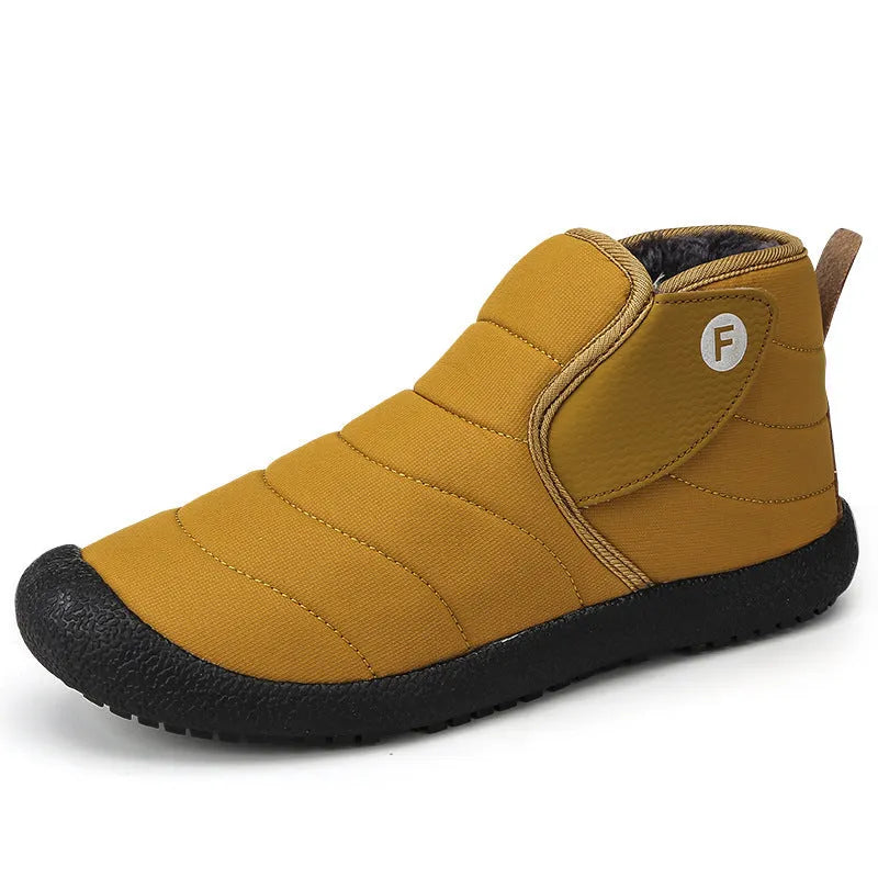 Men's waterproof cotton snow boot with non-slip rubber sole on hard ground