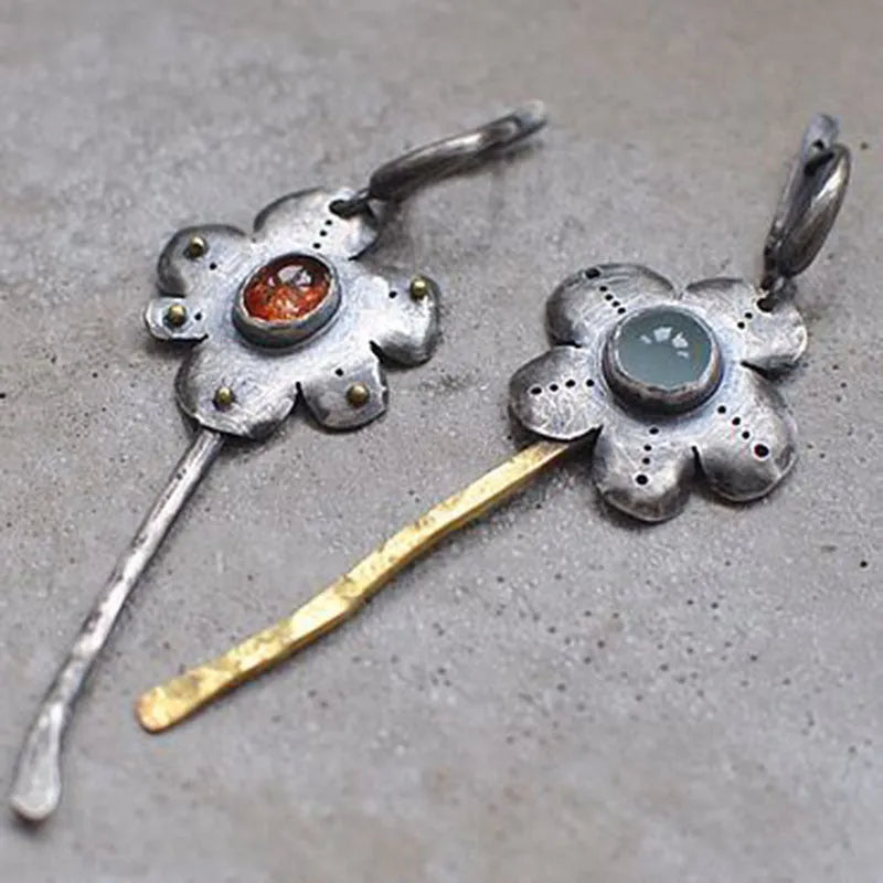 Retro style two-tone geometric drop earrings with asymmetric floral design