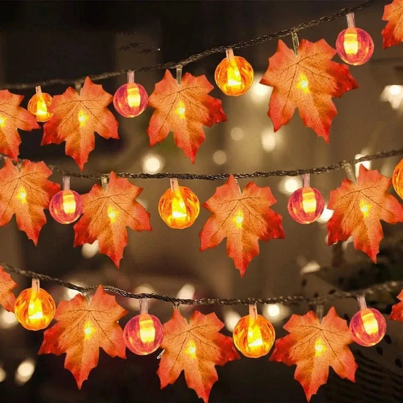 Halloween LED string lights with pumpkin and maple leaf designs, 1.5m 10-light warm white battery-operated decoration