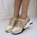 Women's lace up wedge flat sneakers in beige, round toe, artificial PU upper, side view