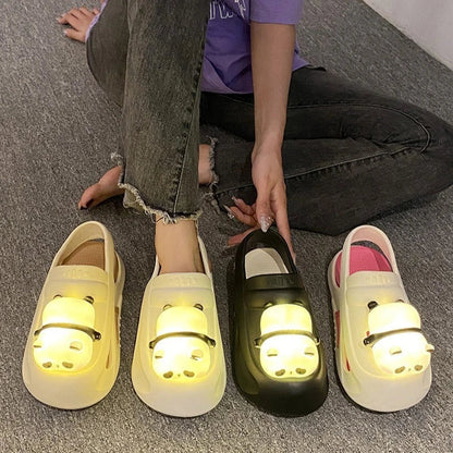 Adorable panda-themed slippers with LED lamp feature, offering cozy comfort and whimsical style for summer