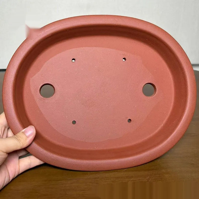 Purple sand handmade oval ceramic flowerpot in cinnabar sand colour for desktop or floor plant display