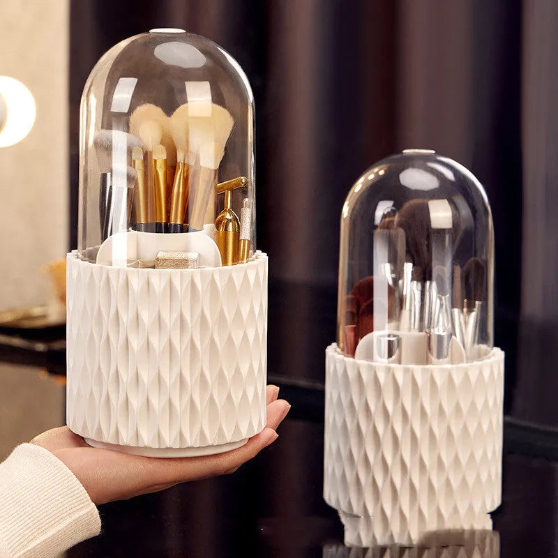 White rotating transparent acrylic makeup brush storage box with lid open showing brush compartments
