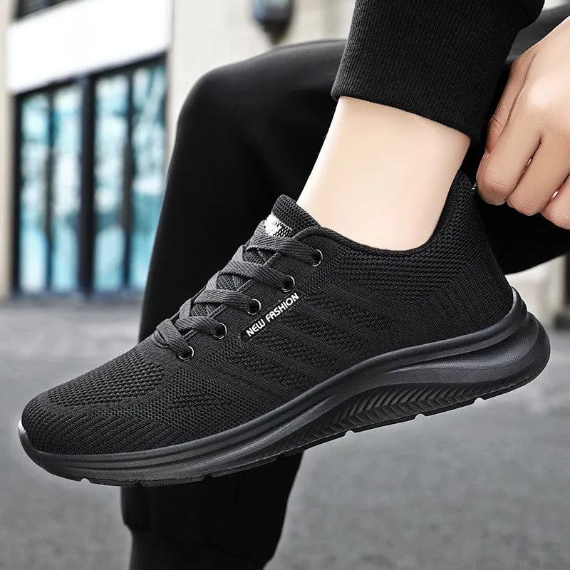 Unisex black mesh trainers in solid colour, sizes 36-44, casual shoes for men and women