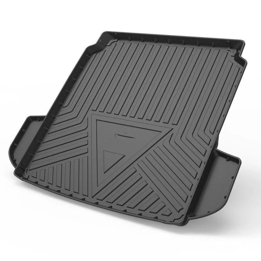 Black car boot liner with carbon fibre pattern texture, made from TPE material.