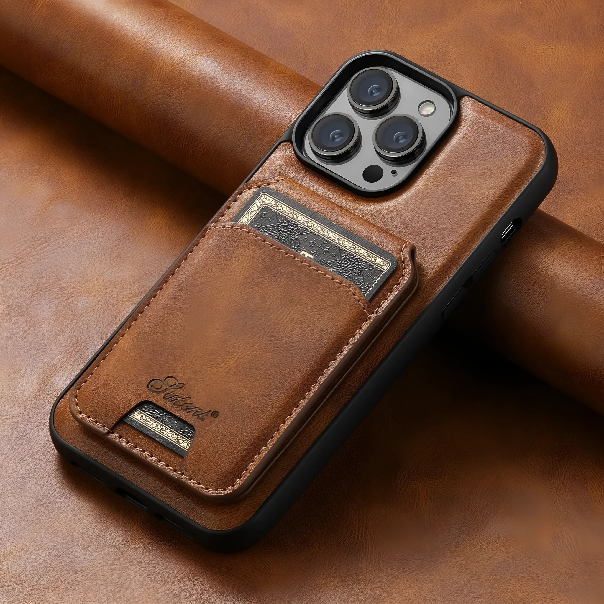 Black silicone Magsafe iPhone case with built-in rear card holder and oil wax pattern finish.