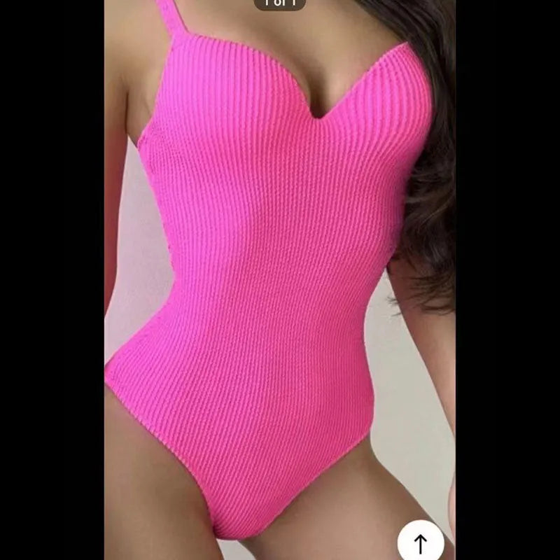 Women's black sunken stripe one-piece swimsuit with sleeveless design for swimming