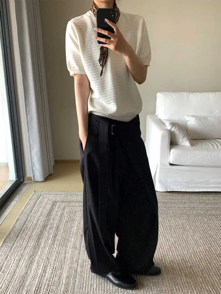Black straight-leg trousers with adjustable waist and single pleat front in Tencel cotton fabric