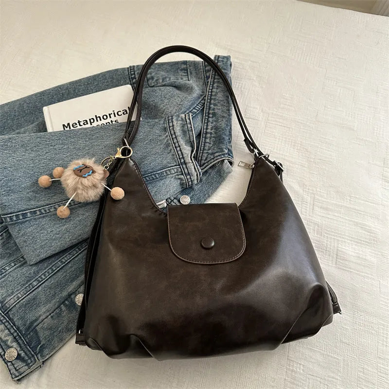 Women's textured PU leather commuter shoulder bag with horizontal design and single strap