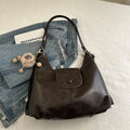 Women's textured PU leather commuter shoulder bag with horizontal design and single strap