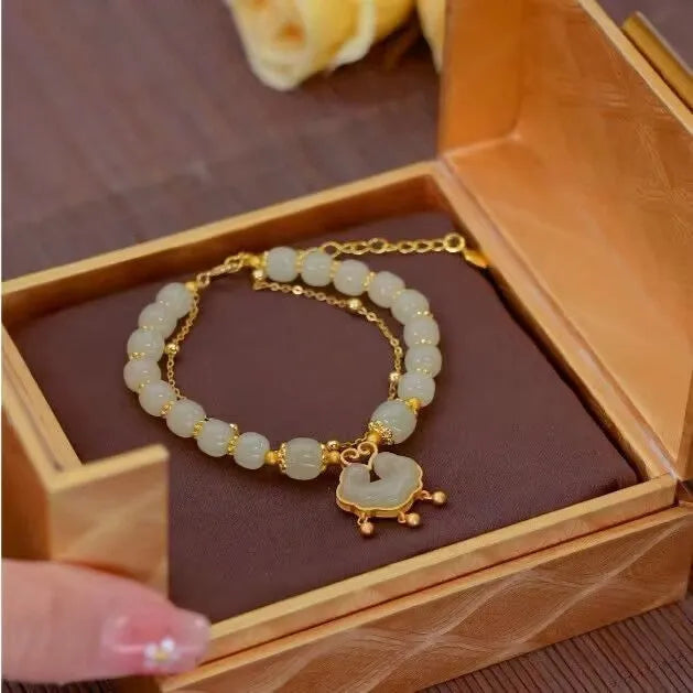 Women's green safety lock bell pendant bracelet with double-layer construction