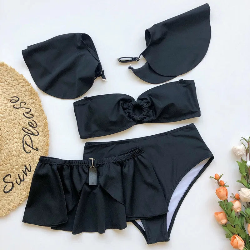 Women's red or black flounced three-piece bikini swimsuit on a mannequin.