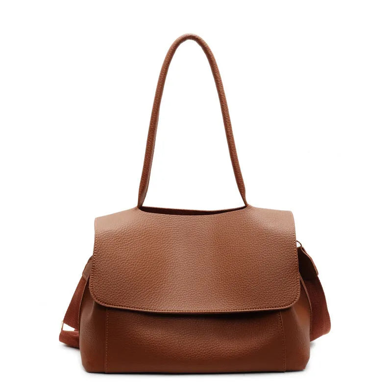 Vintage style square tote bag in PU leather-look material with visible stitching detail.