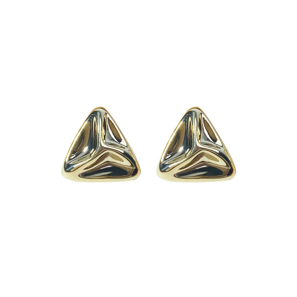 Pair of golden triangle dangle earrings with hook back and textured surface on white background
