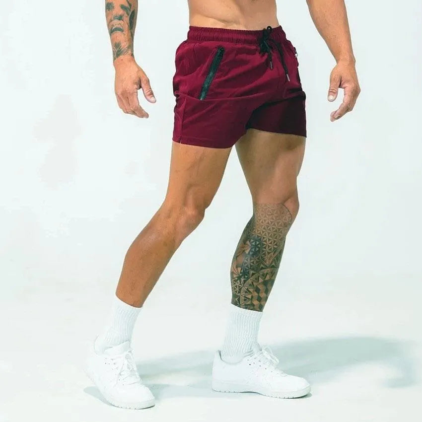 Men's blue quick-drying polyester sports shorts with a mid-waist casual design