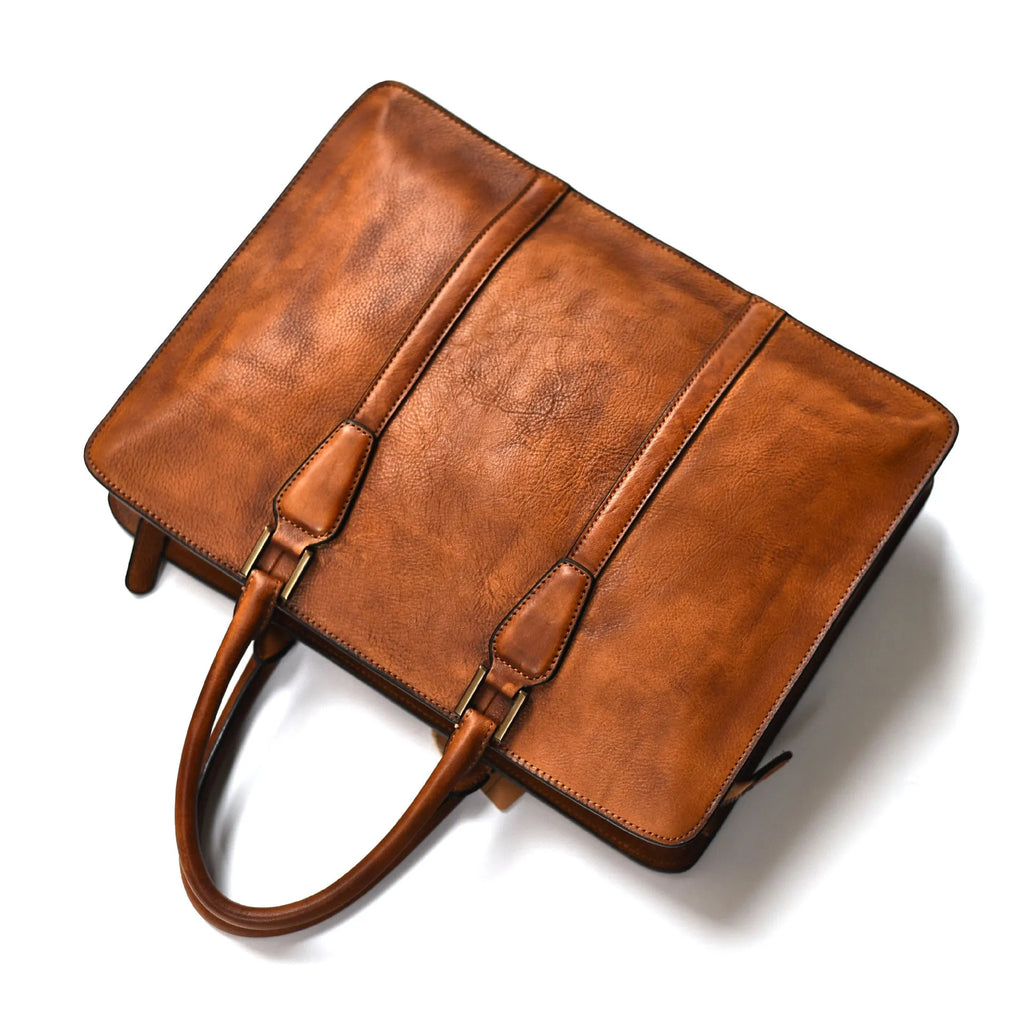 Men's 14-inch vegetable tanned leather handbag in horizontal square design with zipper