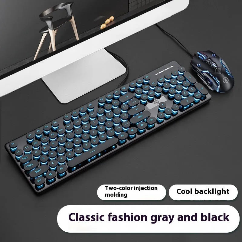 Punk style luminous keyboard in mint green with white backlit keys on a desk.