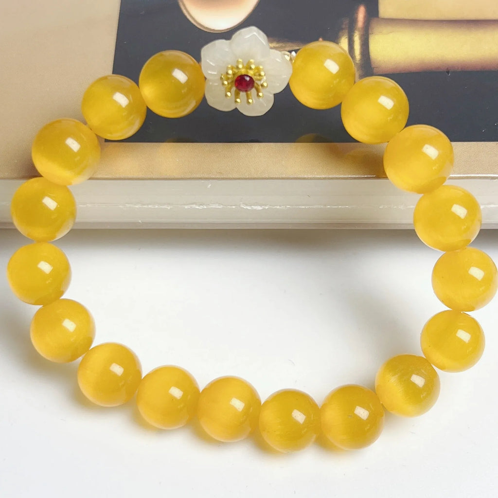 Women's handmade glass bead bracelet with floral design in green, pink, white or yellow