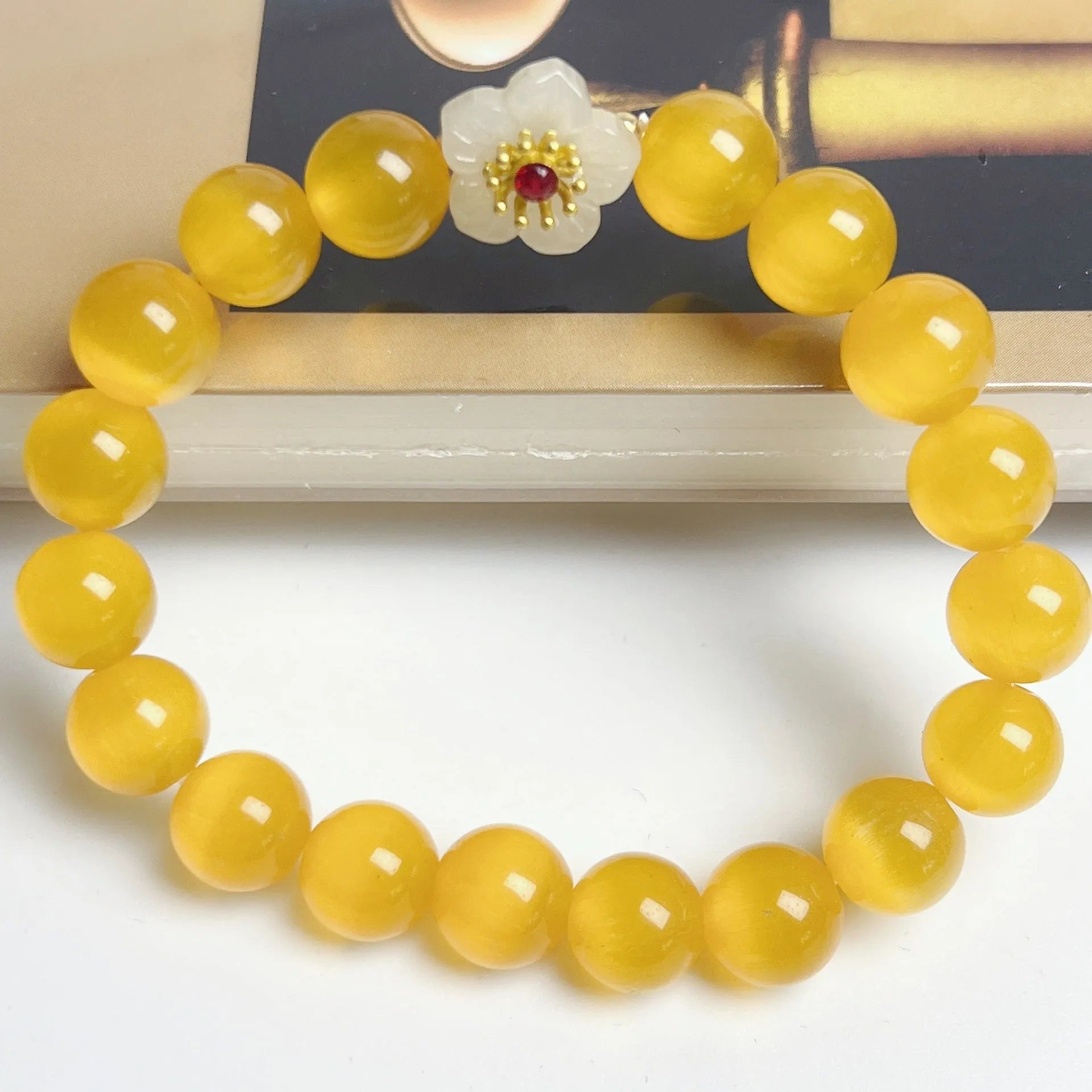 Women's handmade glass bead bracelet with floral design in green, pink, white or yellow