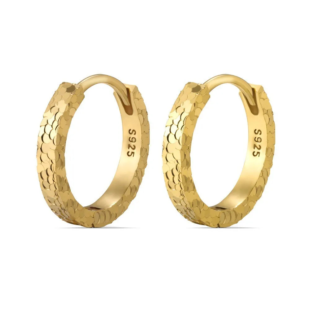 Pair of S925 sterling silver geometric scale stud earrings in gold finish with crushed ice texture