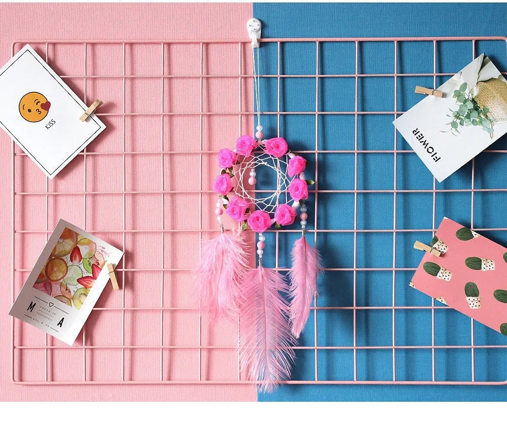 Pink ostrich feather dreamcatcher wind chime measuring 10cm for wall decoration