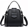 Small square vertical handbag in soft textured PU leather with zip closure and sewing thread detail